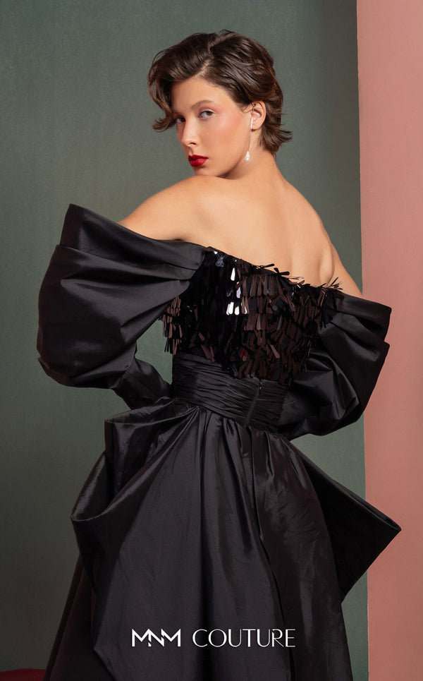 MNM Couture GOF2506 ball gown with a ruched strapless bodice and a voluminous full-length skirt crafted from layers of silver taffeta and delicate tulle. | Couture Shop LA