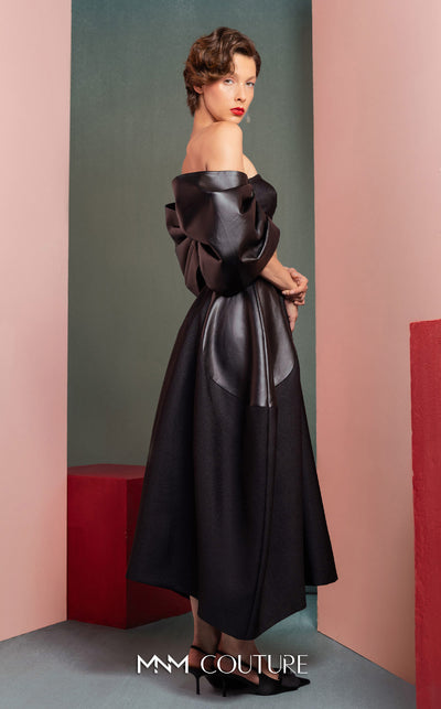 MNM Couture GOF2509 gown featuring an intricately embellished illusion tulle bodice and a full, voluminous skirt made of luxurious silver taffeta. | Couture Shop LA