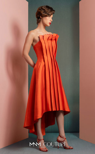 MNM Couture GOF2510 gown in vibrant red taffeta, featuring a dramatic off-shoulder neckline with cascading ruffles and a sleek, floor-length skirt. | Couture Shop LA