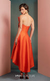 MNM Couture GOF2510 gown in vibrant red taffeta, featuring a dramatic off-shoulder neckline with cascading ruffles and a sleek, floor-length skirt. | Couture Shop LA