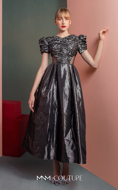 MNM Couture GOF2512 dress in anthracite taffeta, featuring a ruched bodice, voluminous puff sleeves, an A-line midi skirt, and transparent mesh side panels. | Couture Shop LA