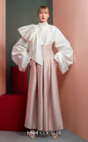 MNM Couture GOF2523 two-piece ensemble, featuring a white taffeta blouse with dramatically oversized sleeves and a front knot, paired with pink taffeta high-waisted, wide-leg pants. | Couture Shop LA
