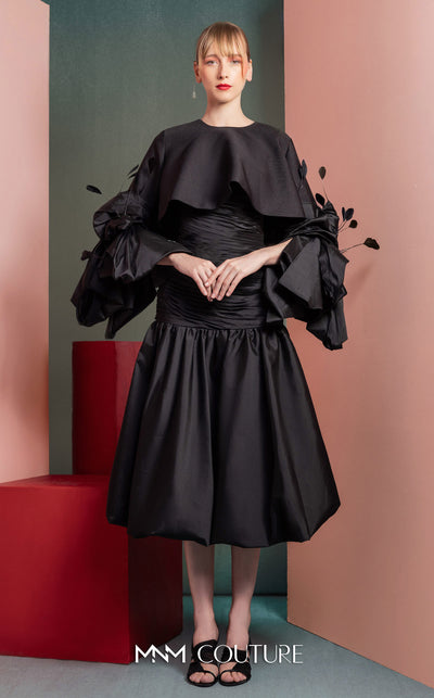 MNM Couture GOF2525 ball gown in black taffeta, featuring an elegantly draped bodice and a voluminous, floor-sweeping skirt. | Couture Shop LA