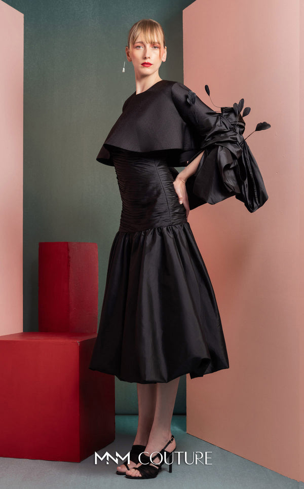 MNM Couture GOF2525 ball gown in black taffeta, featuring an elegantly draped bodice and a voluminous, floor-sweeping skirt. | Couture Shop LA