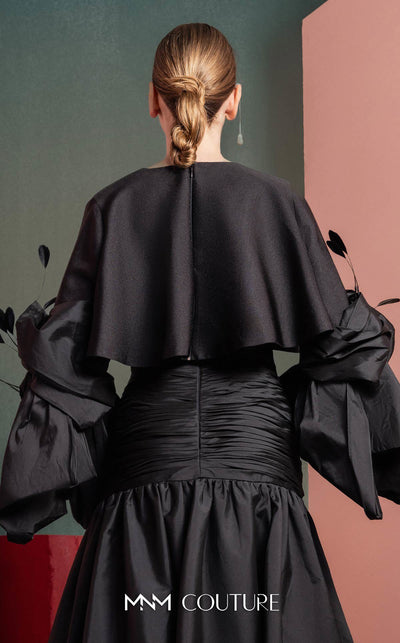 MNM Couture GOF2525 ball gown in black taffeta, featuring an elegantly draped bodice and a voluminous, floor-sweeping skirt. | Couture Shop LA