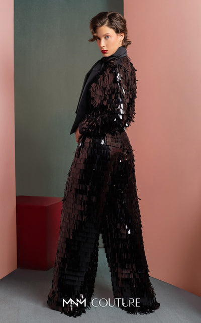 MNM Couture GOF2526 two-piece black sequin ensemble, featuring a long-sleeve blouse with a large taffeta bow at the neck and matching flared sequin pants. | Couture Shop LA