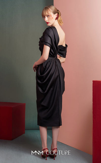 MNM Couture GOF2528 two-piece ensemble in black mikado piqué, featuring a sculpted skirt with intricate draping and a matching draped one-shoulder top. | Couture Shop LA