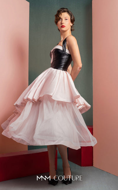 MNM Couture GOF2530 pink midi dress with a black leather bodice, layered pink tulle, and a cascading asymmetrical taffeta overlay. | Couture Shop LA