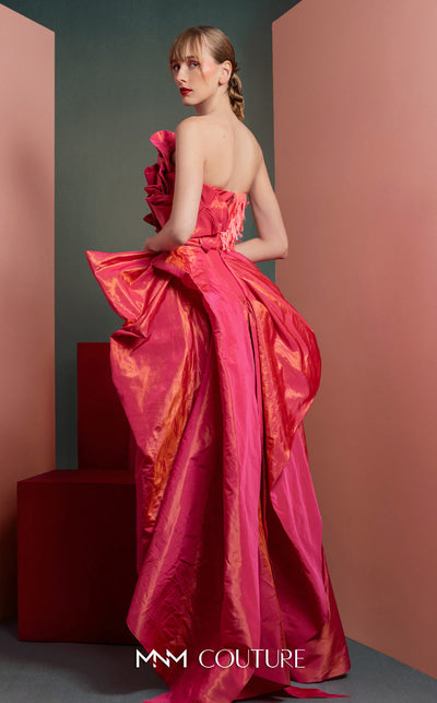 MNM Couture GOF2531 ensemble, featuring a dramatic fuchsia metallic taffeta high-low skirt and a matching sculptural top with a sequin-back finish. | Couture Shop LA