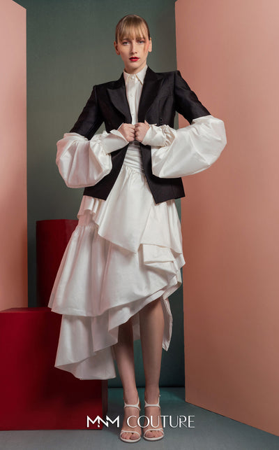 MNM Couture GOF2532 ensemble, featuring a high-low voluminous white taffeta skirt paired with a sharply tailored minimalist black blazer. | Couture Shop LA