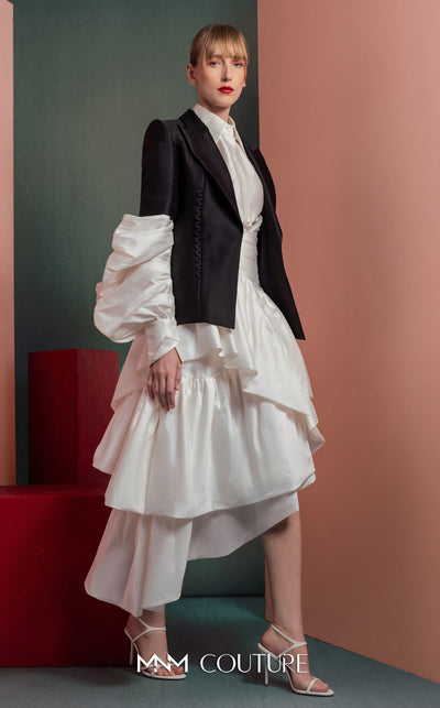 MNM Couture GOF2532 ensemble, featuring a high-low voluminous white taffeta skirt paired with a sharply tailored minimalist black blazer. | Couture Shop LA