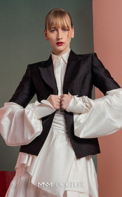 MNM Couture GOF2532 ensemble, featuring a high-low voluminous white taffeta skirt paired with a sharply tailored minimalist black blazer. | Couture Shop LA