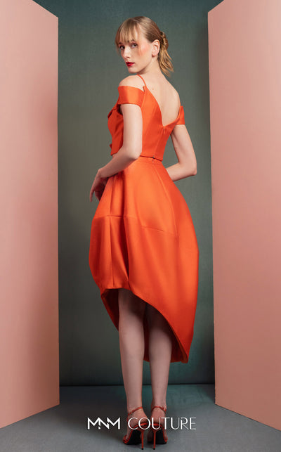 MNM Couture GOF2537 orange mikado piqu� high-low skirt with elegant draping, paired with an off-the-shoulder ruffled cropped top. | Couture Shop LA