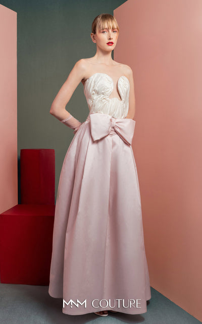 MNM Couture GOF2540 two-piece ensemble, featuring a structured white taffeta corset with draped detailing and a matching full-length taffeta skirt with a large bow accent at the waist. | Couture Shop LA