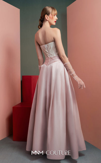 MNM Couture GOF2540 two-piece ensemble, featuring a structured white taffeta corset with draped detailing and a matching full-length taffeta skirt with a large bow accent at the waist. | Couture Shop LA