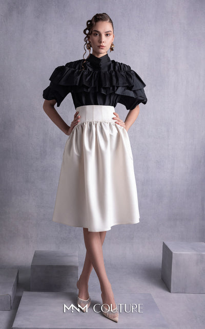 MNM Couture GOS2506 High-waisted gold champagne razmir skirt with gathered details and black taffeta top with cascading ruffles and a structured neckline. | Couture Shop LA
