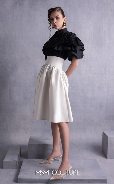 MNM Couture GOS2506 High-waisted gold champagne razmir skirt with gathered details and black taffeta top with cascading ruffles and a structured neckline. | Couture Shop LA