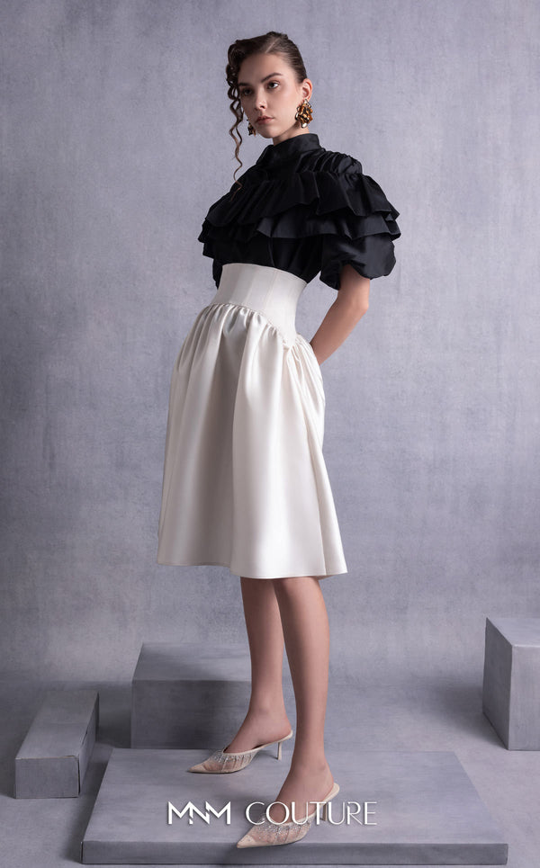 MNM Couture GOS2506 High-waisted gold champagne razmir skirt with gathered details and black taffeta top with cascading ruffles and a structured neckline. | Couture Shop LA