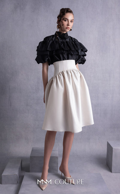 MNM Couture GOS2506 High-waisted gold champagne razmir skirt with gathered details and black taffeta top with cascading ruffles and a structured neckline. | Couture Shop LA