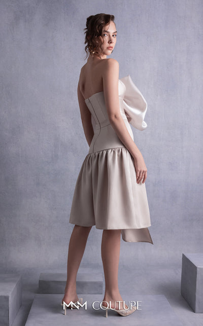 MNM Couture GOS2512 Gold champagne piqu� dress with sculptural organza bust manipulation, crystal embellishments, and asymmetrical skirt. | Couture Shop LA