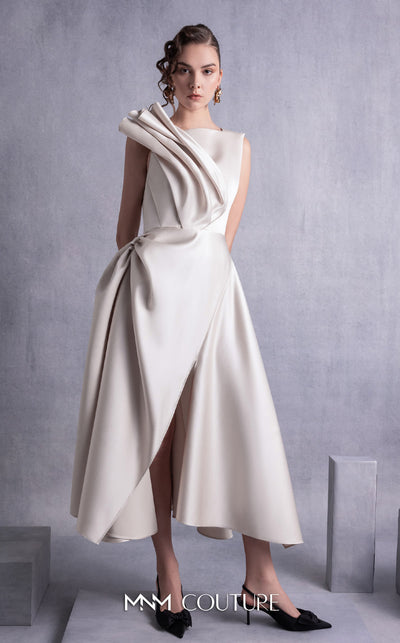 MNM Couture GOS2517 Gold champagne razmir dress with draped shoulder, cinched waist, and high slit, perfect for elegant evenings. | Couture Shop LA