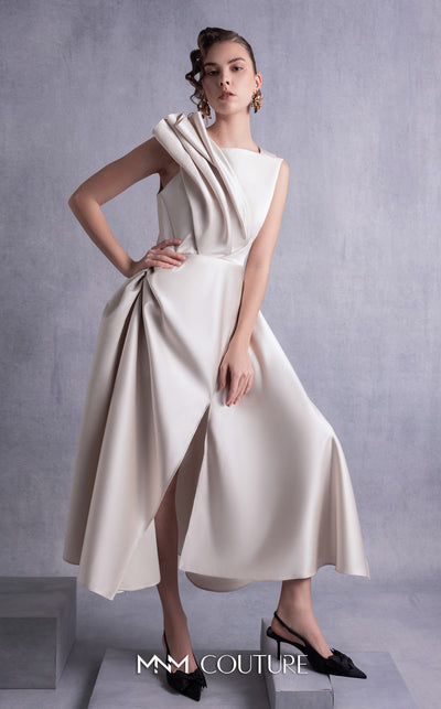 MNM Couture GOS2517 Gold champagne razmir dress with draped shoulder, cinched waist, and high slit, perfect for elegant evenings. | Couture Shop LA