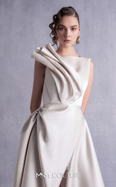 MNM Couture GOS2517 Gold champagne razmir dress with draped shoulder, cinched waist, and high slit, perfect for elegant evenings. | Couture Shop LA