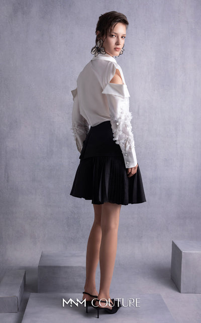 MNM Couture GOS2519 Black piqué skirt with bow design and off-white taffeta blouse with embroidered sleeves and cut-out shoulders. | Couture Shop LA