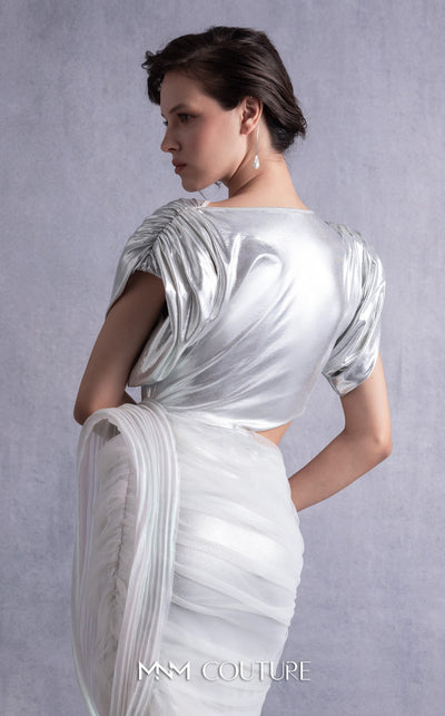 MNM Couture GOS2523 Silver lamé lycra dress with cutout design, side knot, draped tulle, and ribbed lamé organza accents. | Couture Shop LA