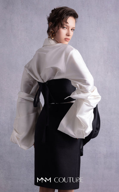 MNM Couture GOS2526 Black piqué pencil skirt with organza manipulation and off-white taffeta blouse with exaggerated puffed sleeves. | Couture Shop LA