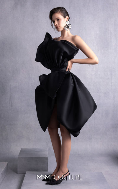 MNM Couture GOS2528 Black organza cocktail dress with asymmetric neckline, sculptural draping, and cinched waistline. | Couture Shop LA