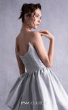MNM Couture GOS2538 Silver mikado piqué strapless dress with angled bust design and layered ruffled skirt. | Couture Shop LA
