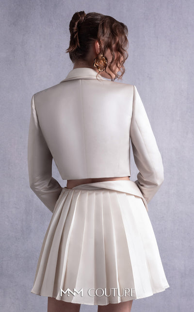 MNM Couture GOS2539 Pleated gold champagne razmir skirt with draped accents and cropped razmir jacket with tailored lapels. | Couture Shop LA