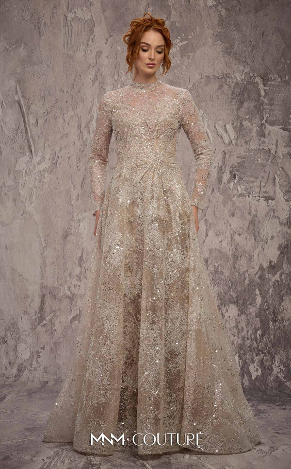 MNM Couture Style J02720 sequined A-line gown with long sleeves, high neckline, and starburst waist detail. \ Couture Shop LA