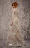 MNM Couture Style J02720 sequined A-line gown with long sleeves, high neckline, and starburst waist detail. \ Couture Shop LA