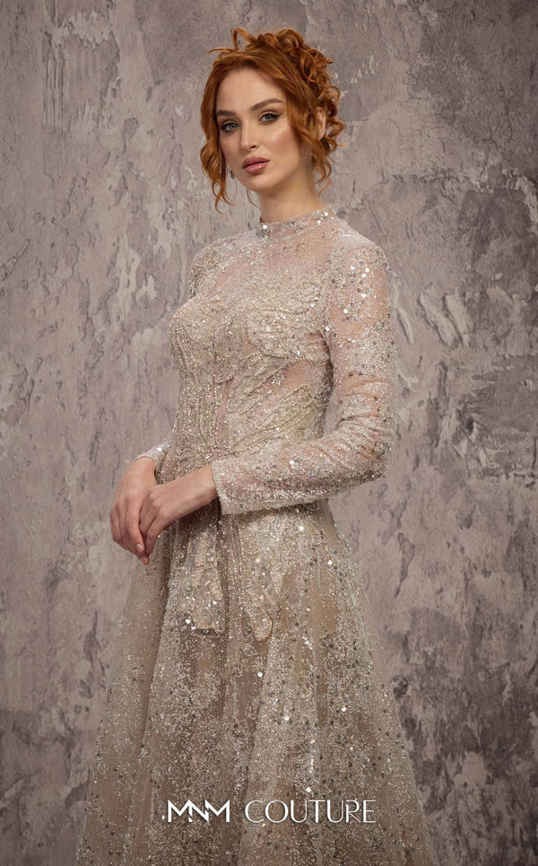 MNM Couture Style J02720 sequined A-line gown with long sleeves, high neckline, and starburst waist detail. \ Couture Shop LA