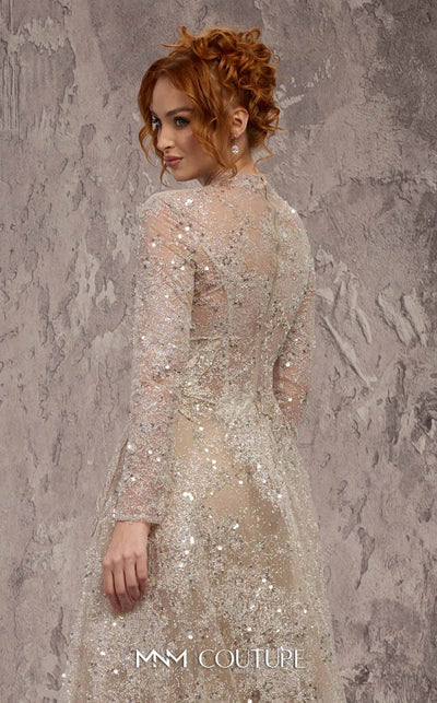 MNM Couture Style J02720 sequined A-line gown with long sleeves, high neckline, and starburst waist detail. \ Couture Shop LA
