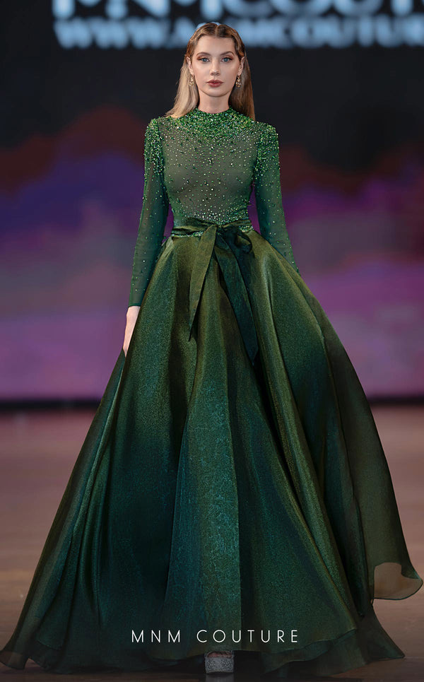 MNM Couture Style J03038 ballgown with an embellished top, organza skirt, and waist bow detail. \ Couture Shop LA