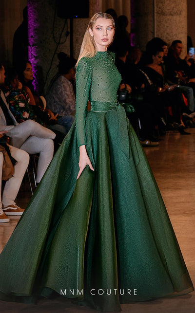 MNM Couture Style J03038 ballgown with an embellished top, organza skirt, and waist bow detail. \ Couture Shop LA