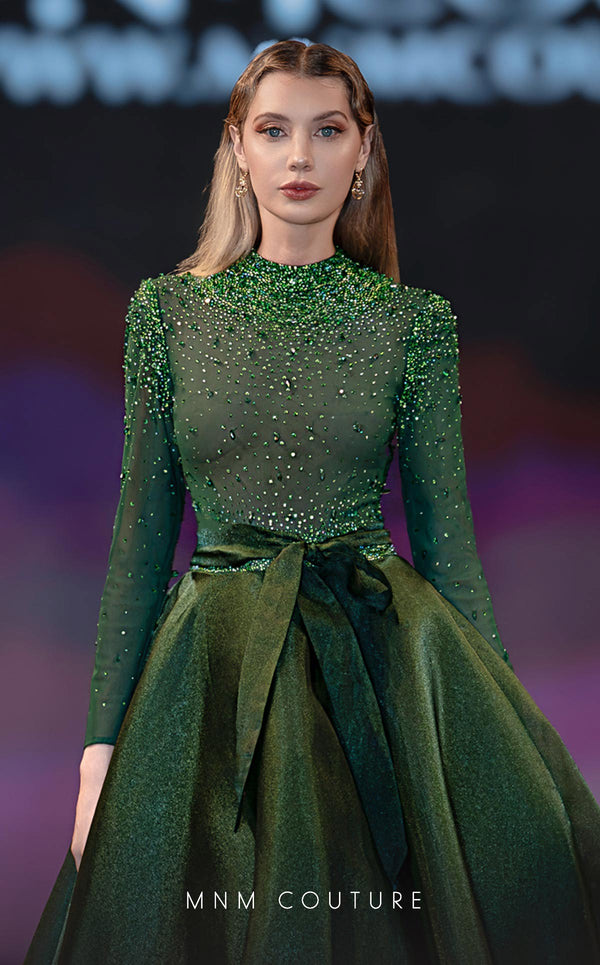 MNM Couture Style J03038 ballgown with an embellished top, organza skirt, and waist bow detail. \ Couture Shop LA