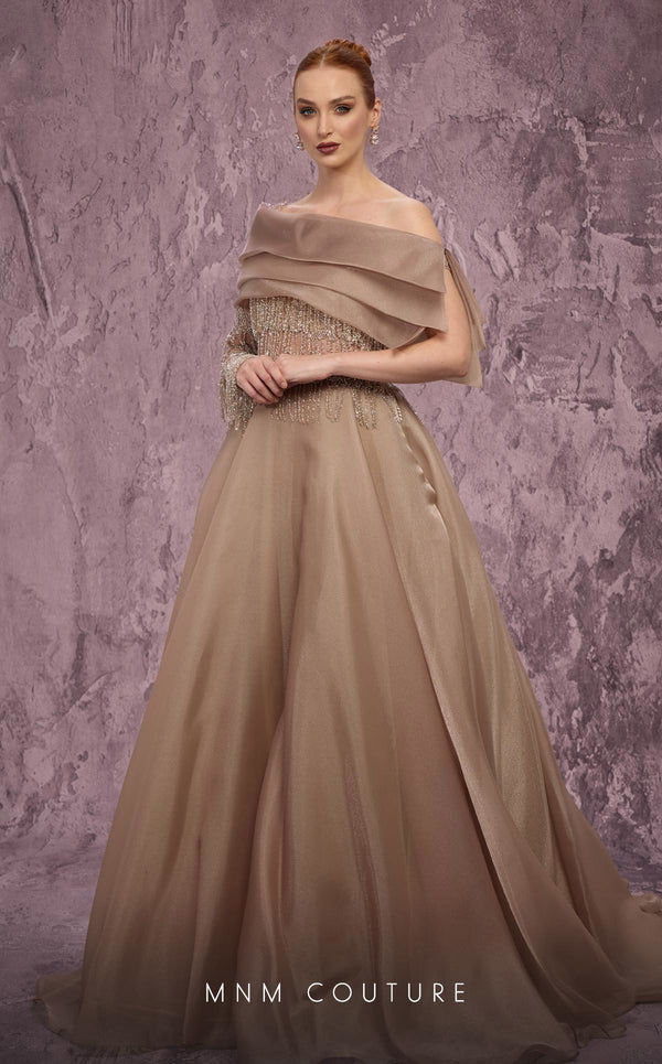 MNM Couture Style J03308 one-sleeved ballgown with beaded fringe, organza skirt, and asymmetrical neckline. \ Couture Shop LA