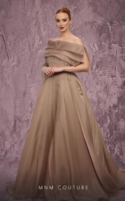 MNM Couture Style J03308 one-sleeved ballgown with beaded fringe, organza skirt, and asymmetrical neckline. \ Couture Shop LA