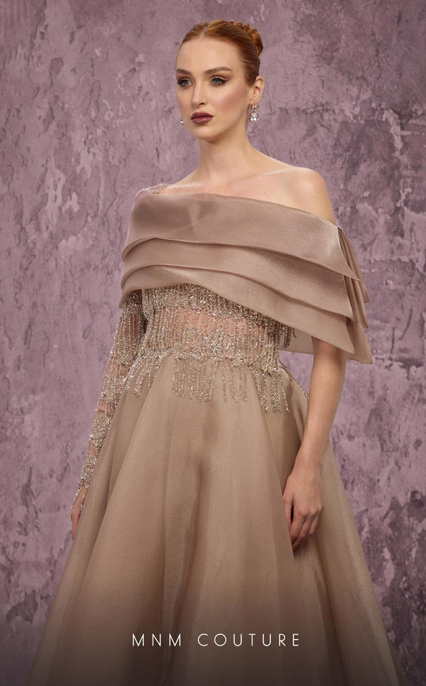 MNM Couture Style J03308 one-sleeved ballgown with beaded fringe, organza skirt, and asymmetrical neckline. \ Couture Shop LA