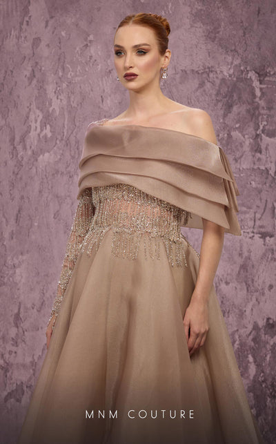 MNM Couture Style J03308 one-sleeved ballgown with beaded fringe, organza skirt, and asymmetrical neckline. \ Couture Shop LA
