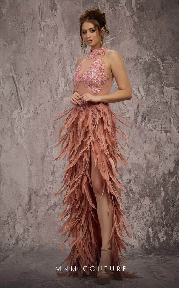 MNM Couture Style J03381 feathered column gown with a sequined top and dramatic split. \ Couture Shop LA