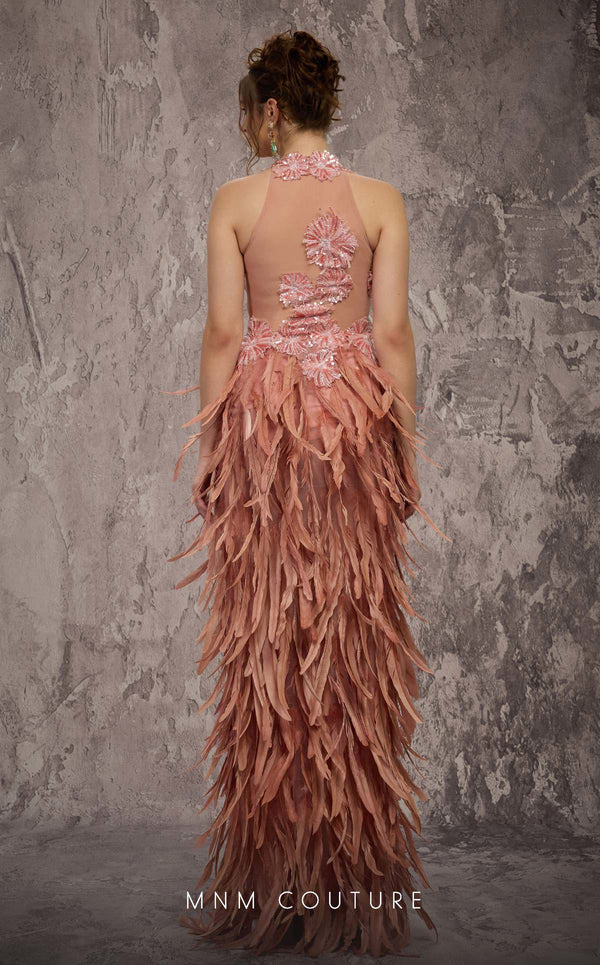 MNM Couture Style J03381 feathered column gown with a sequined top and dramatic split. \ Couture Shop LA