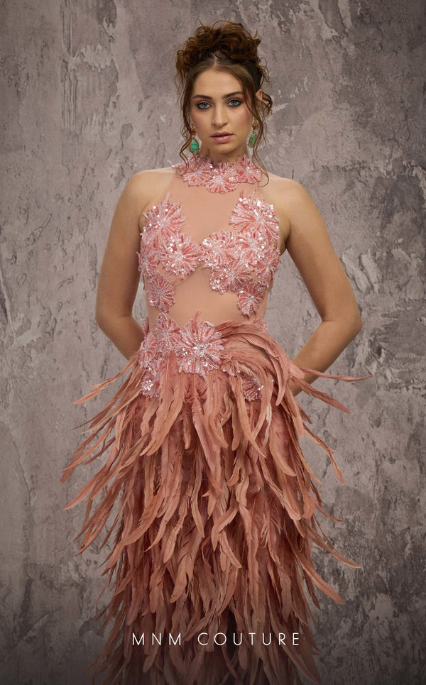 MNM Couture Style J03381 feathered column gown with a sequined top and dramatic split. \ Couture Shop LA