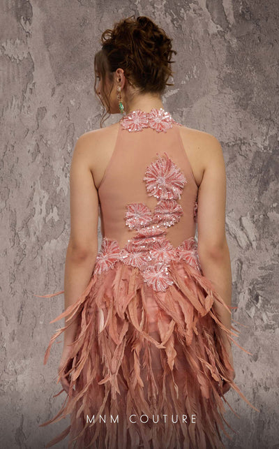 MNM Couture Style J03381 feathered column gown with a sequined top and dramatic split. \ Couture Shop LA