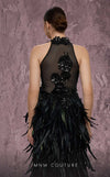 MNM Couture Style J03381 feathered column gown with a sequined top and dramatic split. \ Couture Shop LA