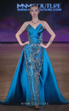 MNM Couture Style J03497 strapless column gown with a beaded skirt, satin train, and asymmetrical deep V-neck. \ Couture Shop LA